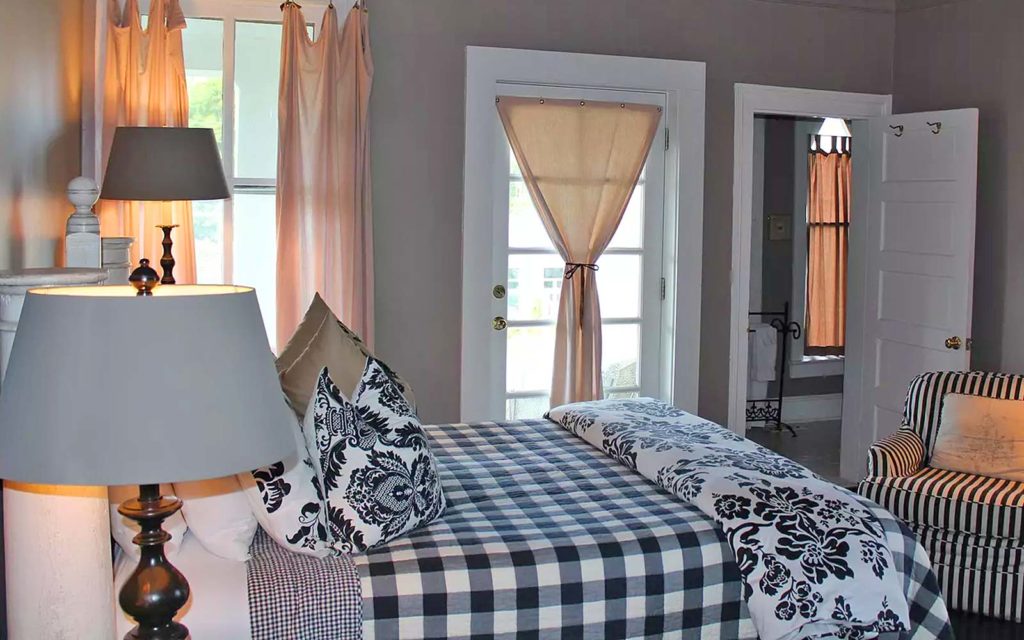 Enjoy one of the best wineries in Virginia while staying in this charming pink and black guest room at our Virginia Bed and Breakfast